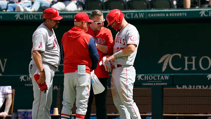 Apr 17, 2022; Arlington, Texas, USA; Los Angeles Angels center fielder Mike Trout (27) is looked at on the field after being hit by a pitch by Texas Rangers relief pitcher Spencer Patton during the fifth inning at Globe Life Field. Mandatory Credit: Raymond Carlin III-USA TODAY Sports